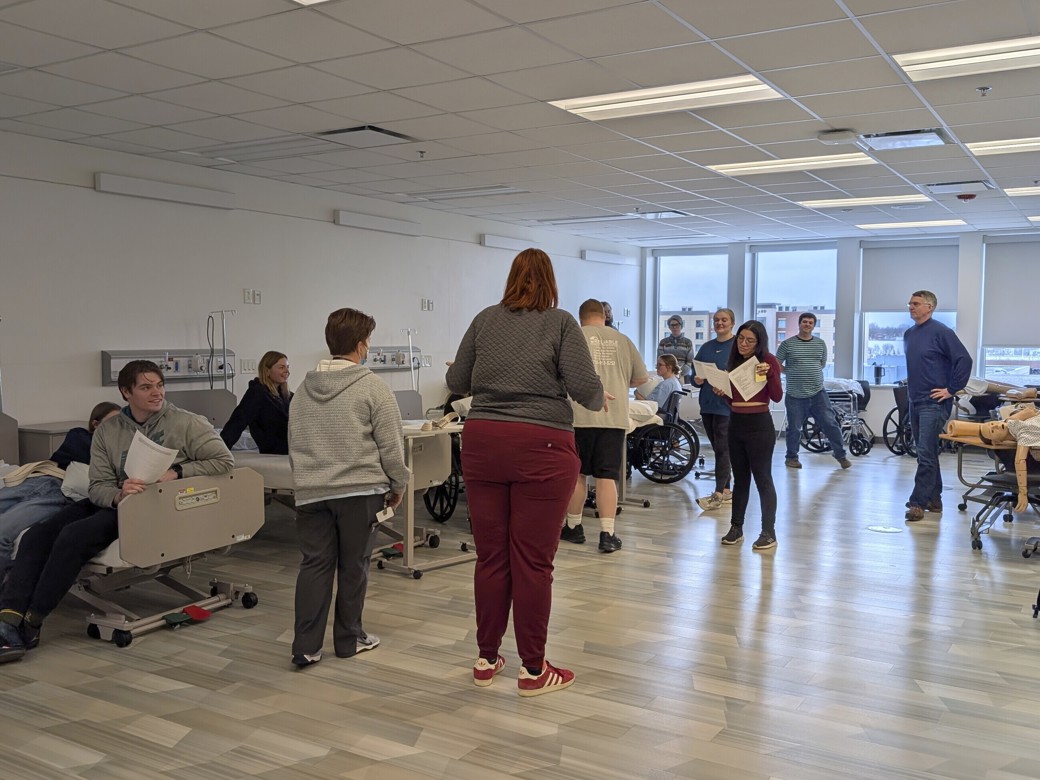 Assistant Professor Siobhan Gillespie instructing students in the Ivy Tech Muncie PTA lab.